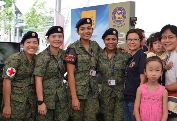  ​Samantha (first from left) engaging with the public about the SAFVC scheme during SAF at The Heartlands in 2016.