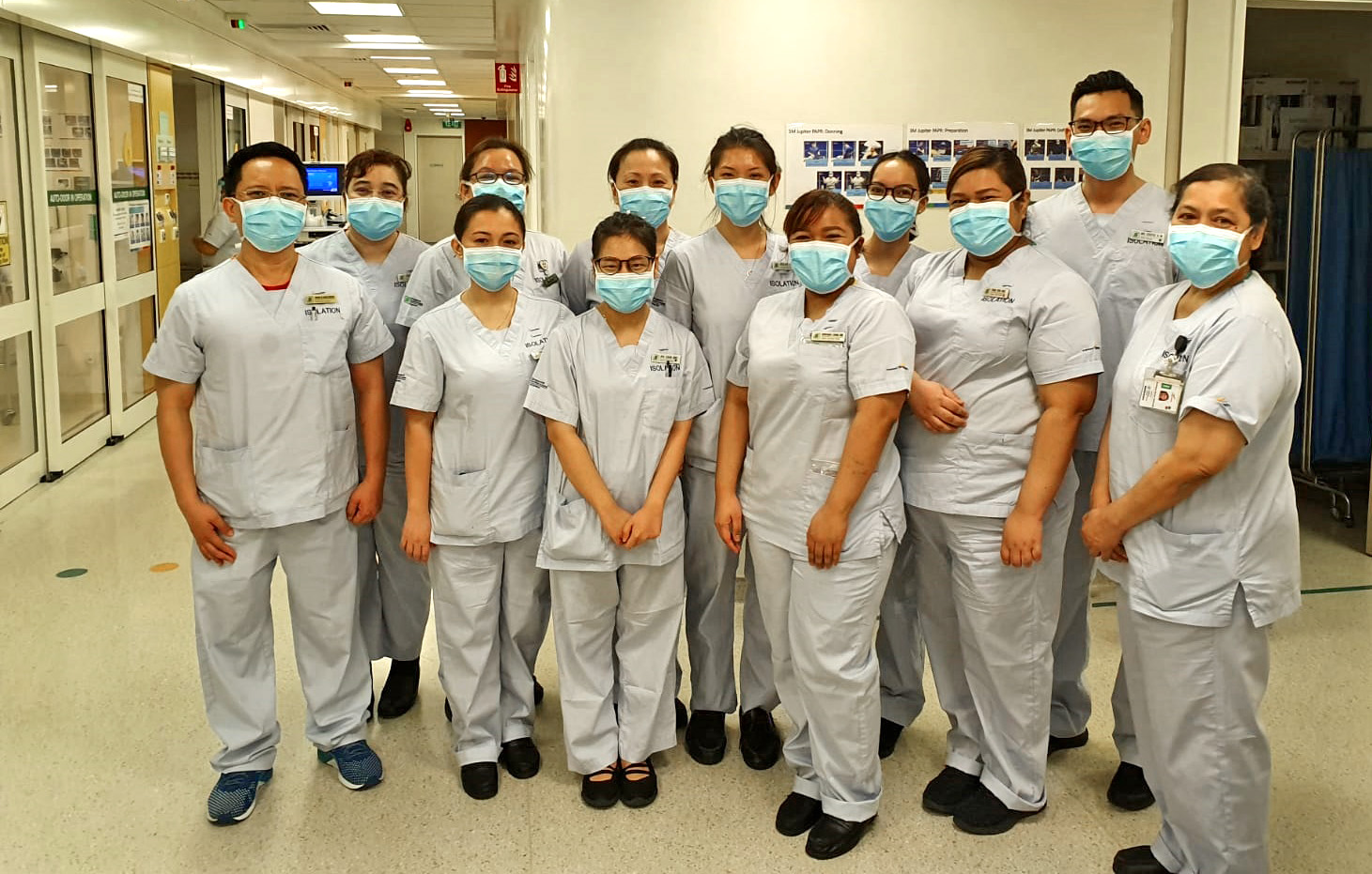  ​NC Syafiq (second from extreme right) has been working at Ward 68 for five years and manages a team of 15 nurses. He started out at Ward 73 (Internal Medicine) ten years ago. 