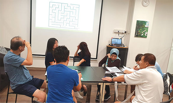 SMaRT programme participants taking part in cognitive exercises.