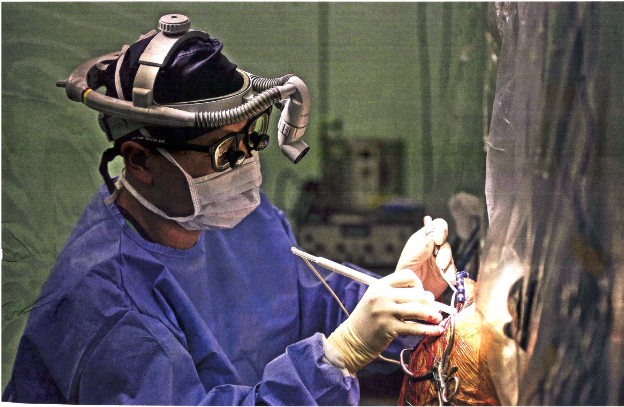  ​Neurosurgeon Ng Wai Hoe beginning the process of removing a tumour from Mr Oh Zhi Long's brain at Tan Tock Seng Hospital on March 28 last year. The job is a delicate one remove too little tissue and the tumour will come back. But take out too much from the wrong spot and Mr Oh could be unable to speak, or be paralysed.