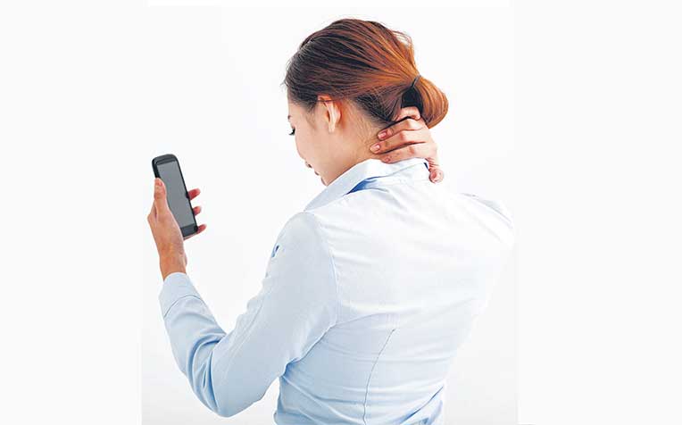 while reading a hand-held device can exert 18kg of stress on the spine. 