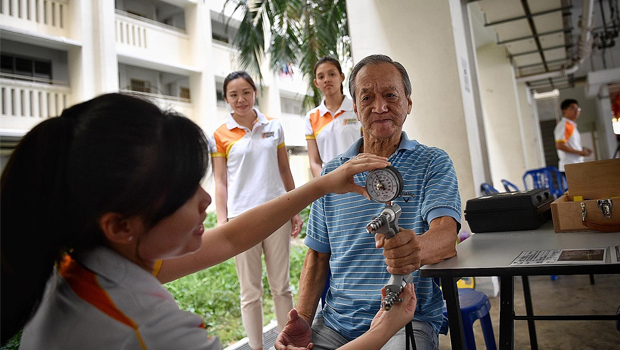  ​PPT for Seniors has nine stations - to measure flexibility, strength and balance. These include a modified sit and reach, walking test and grip strength test, which is what Mr Loy See Wee is doing here.