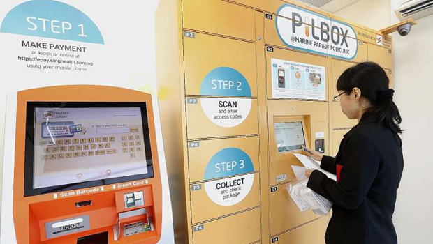  ​The Prescription in a Locker Box service at Marine Parade Polyclinic. To use it, patients with prescriptions must sign up for the service with pharmacy staff. They can then drop their prescription slips at the pharmacy and schedule a date to collect their repeat medication.  ST PHOTO CHEW SENG KIM