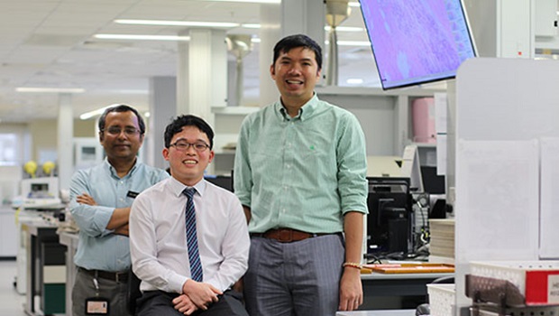  ​Ansel with his supervisors at the SGH Pathology Department, Dr Jabed Iqbal (L) and Dr Joe Yeong (R)
