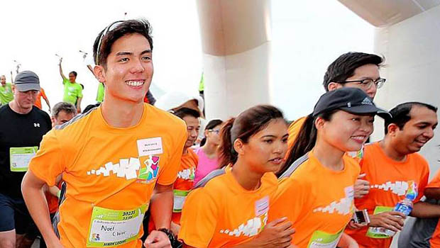  ​​Nearly 10,000 people took part in this year's Run For Hope. The $381,154 raised will go into the NCC Research Fund.   ST PHOTO JONATHAN CHOO