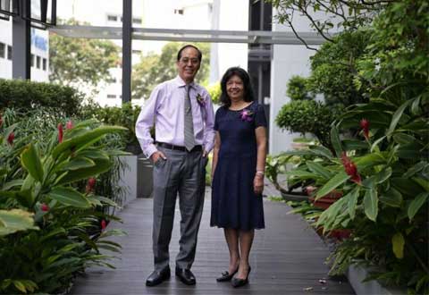  Mr Peter Lee (left) and Mrs Saro Palakrishanan, veteran medical social workers, received appreciation awards for their contributions at an event at Singapore General Hospital to mark the 70th anniversary of medical social service here. ST PHOTO KEVIN LIM
